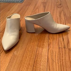 White heeled mules
